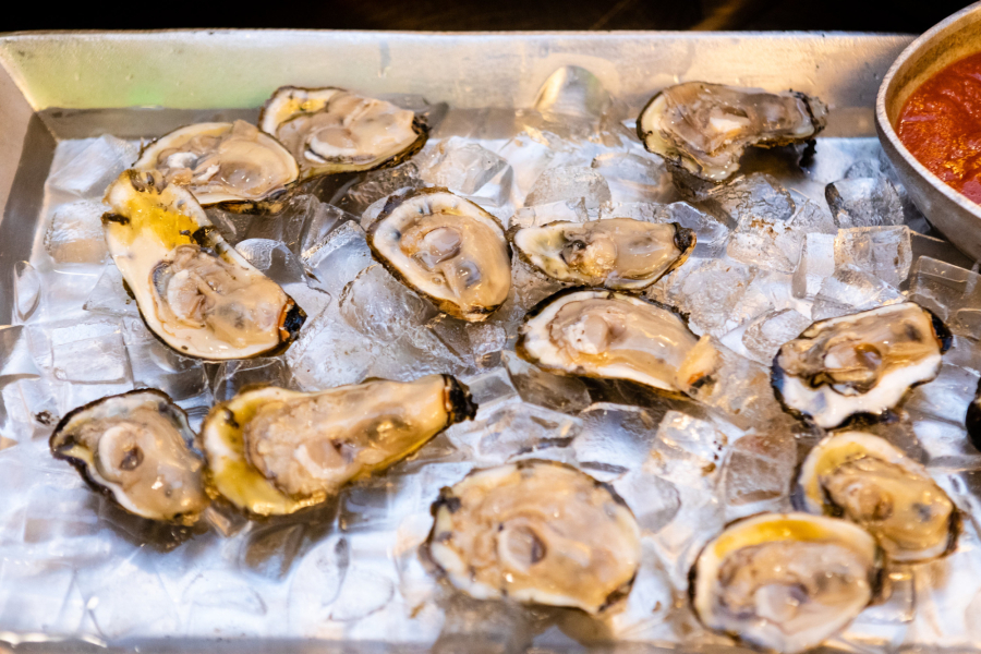 Shucked oysters on ice.