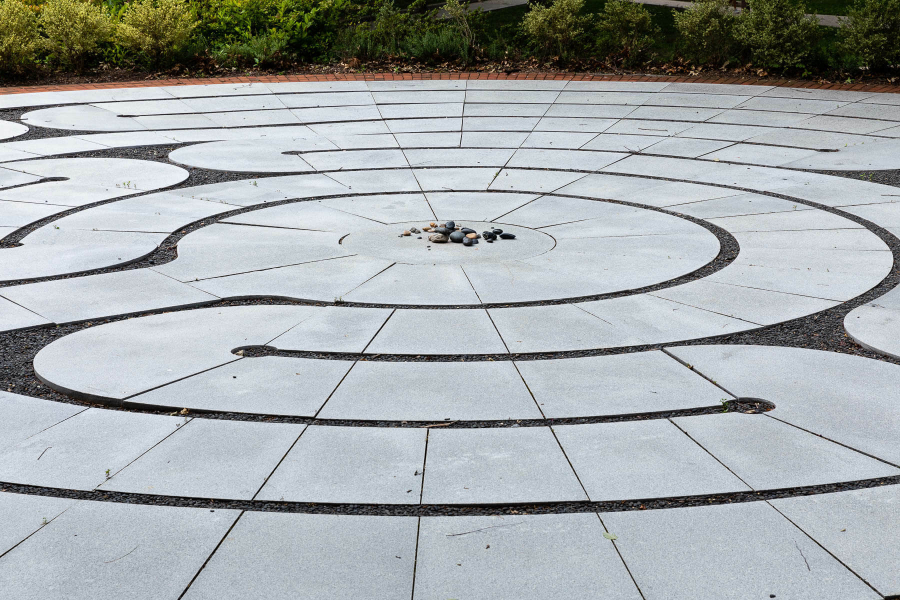 A stone labyrinth with lines circling inward.