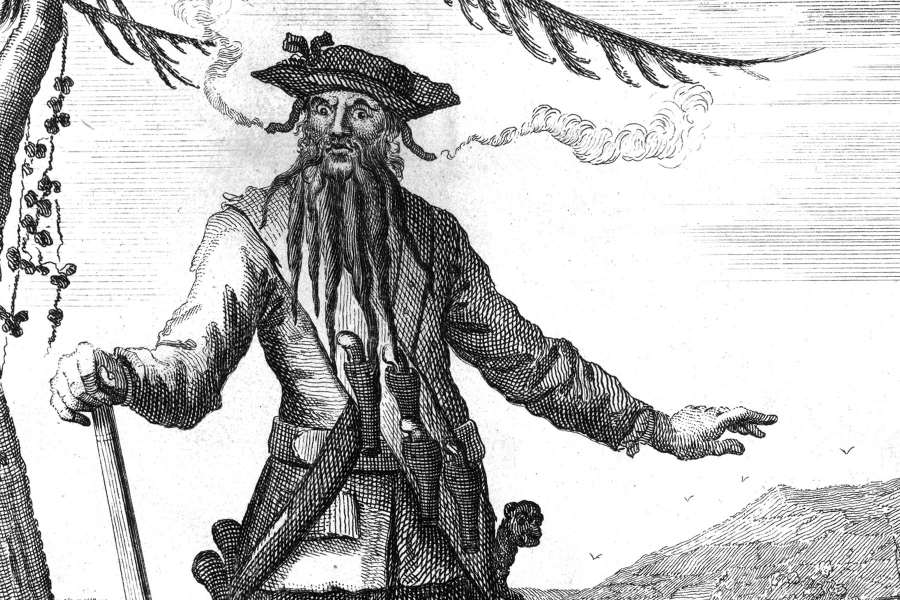 Historical sketch of Blackbeard with lit fuses in his beard