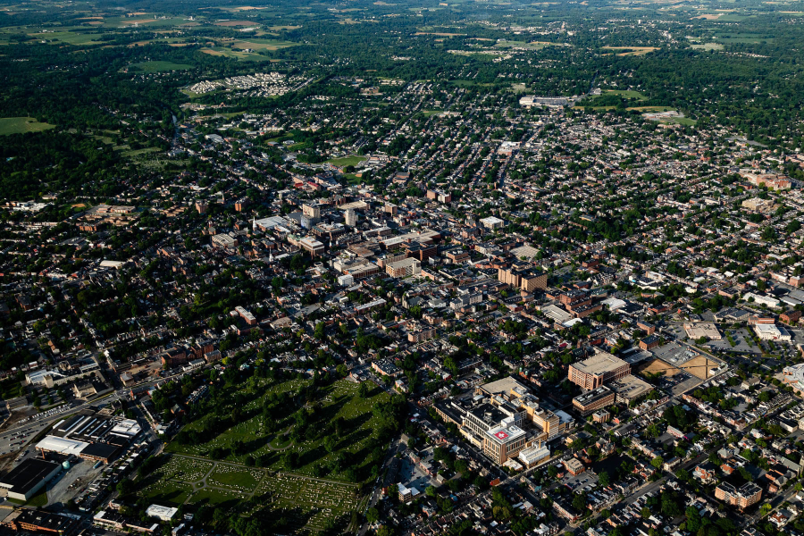 Aerial view of Lancaster, showing a mix of households and farm.