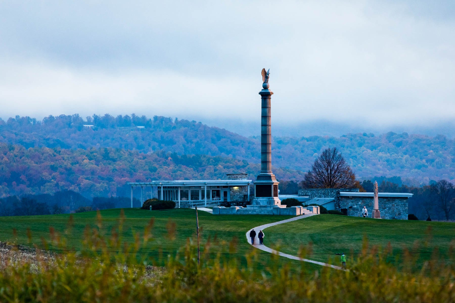 The visitors center at Antietam sits on a ridge with a tall monument rising above.