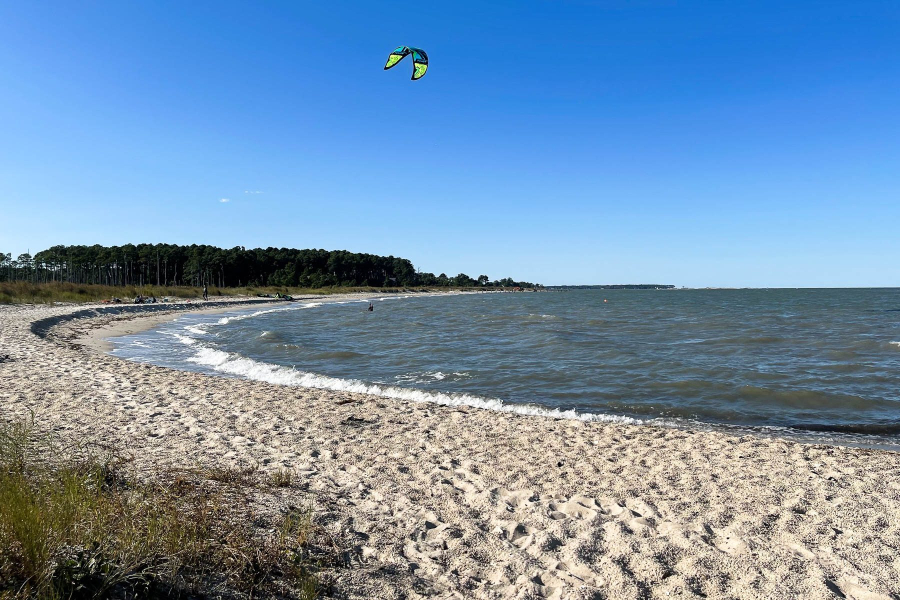 Blue sky and sandy beach.