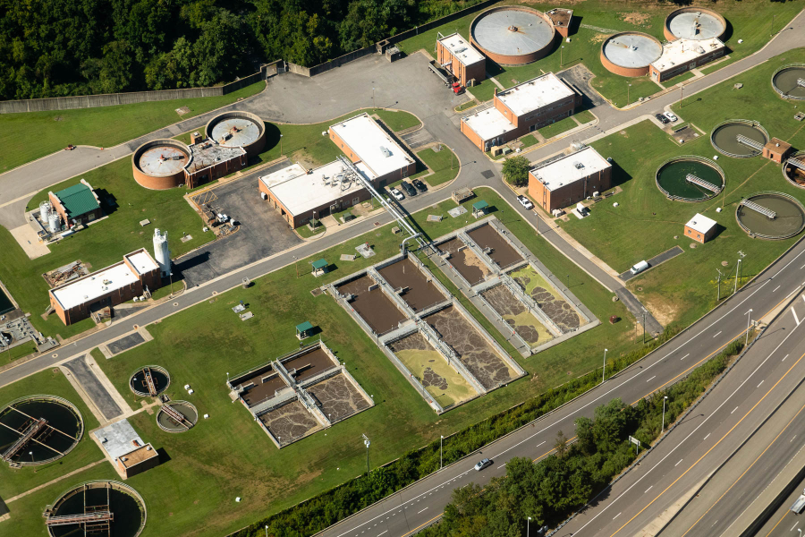 The pools and silos of a wastewater treatment plant are seen from above