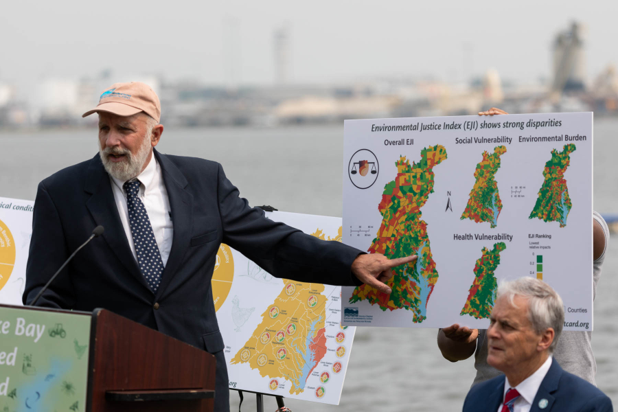 Bill Dennison points to a map showing environmental justice scores for the watershed