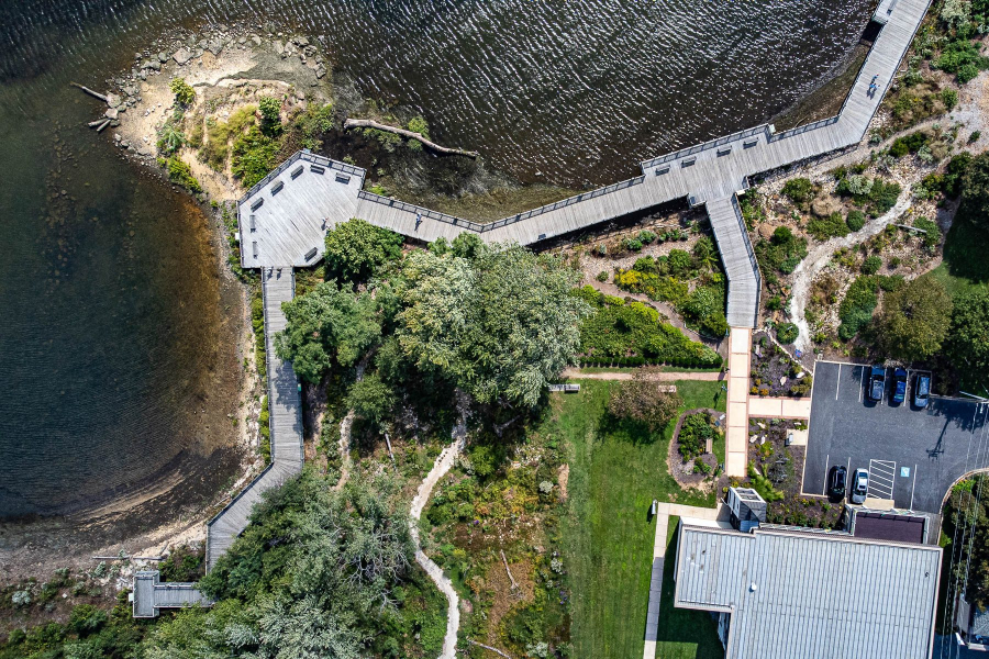 Overhead photo of the shoreline with a boradwalk and shoreline.