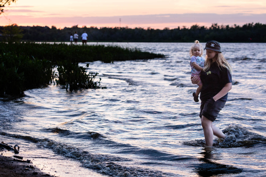 At sunset, City Park fills with visitors drawn to the James River.