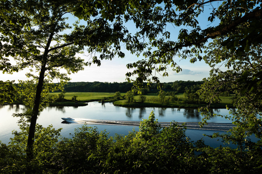 The Appomattox flows past the northern edge of Hopewell, where recreational fishers boat past scenic wetlands.